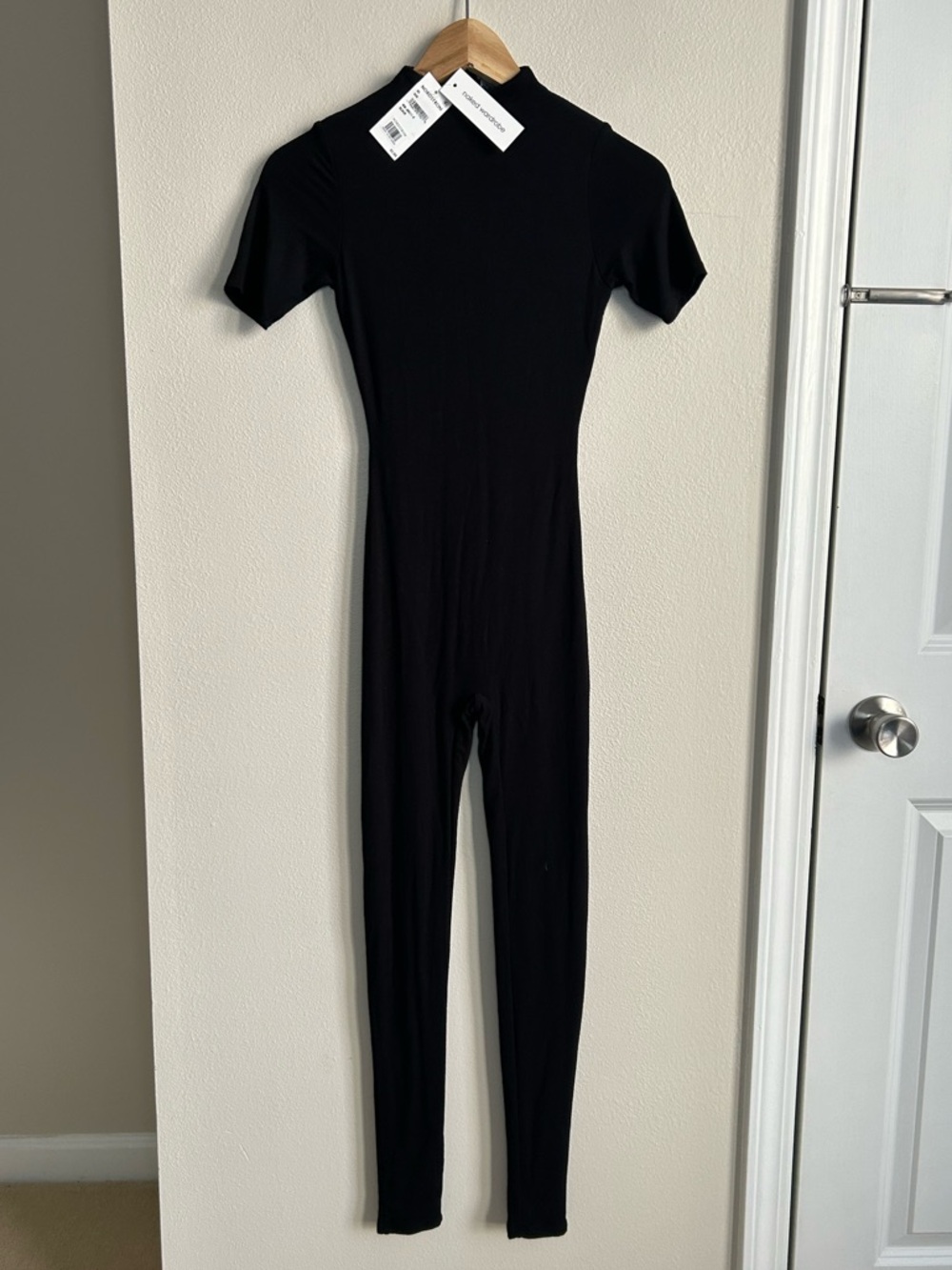 NWT Naked Wardrobe Sculpt Short Sleeve Jumpsuit Black Viscose Mock Neck Size XS - Picture 2 of 9